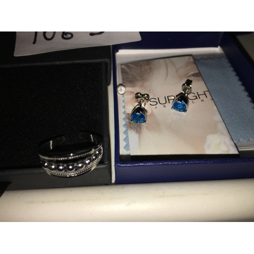 339 - NEW PAIR OF SILVER EARINGS AND ANXIETY RING BOTH IN PRESENTATION BOX
106J