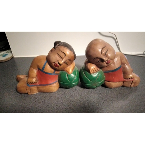 504 - PAIR OF WOODEN ORIENTAL BOOK END FIGURES