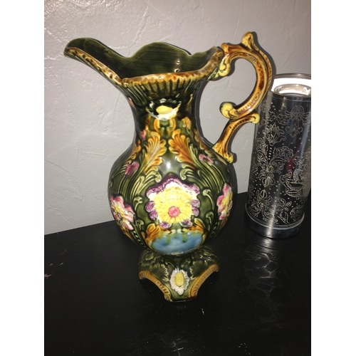 453 - LARGE MAJOLICA JUG HIGHLY DECORATED, With faults repair to handle, and hairline round neck as in pic... 