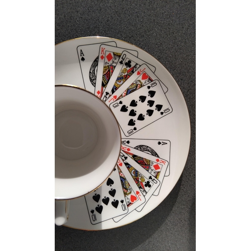 495 - QUEENS ROSINA PLAYING CARD CUP AND SAUCER