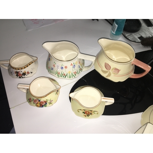 385 - FIVE  VINTAGE CROWN DUCAL CREAM JUGS IN NICE CONDITION