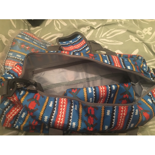 91 - NEW BAGGED PATTERNED TRAVEL BAG WITH MATCHING  TOILETRY BAG