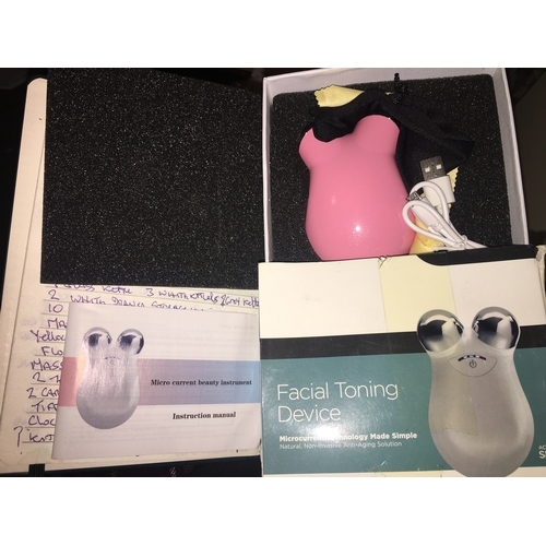 59 - NEW BOXED FACE TONING DEVICE