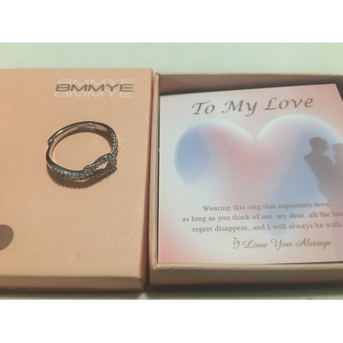 346 - NEW BOXED SILVER INFINITY RING