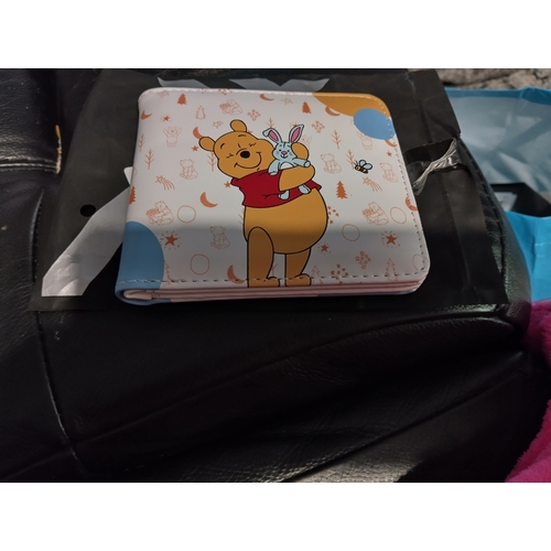 721 - NEW BAGGED WINNIE THE POOH WALLET