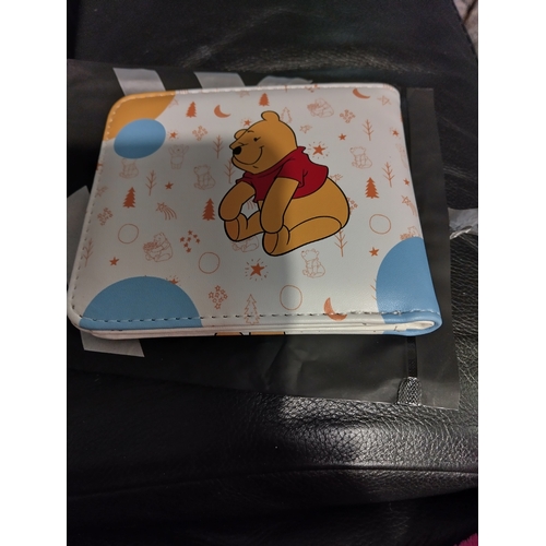 720 - NEW BAGGED WINNIE THE POOH WALLET