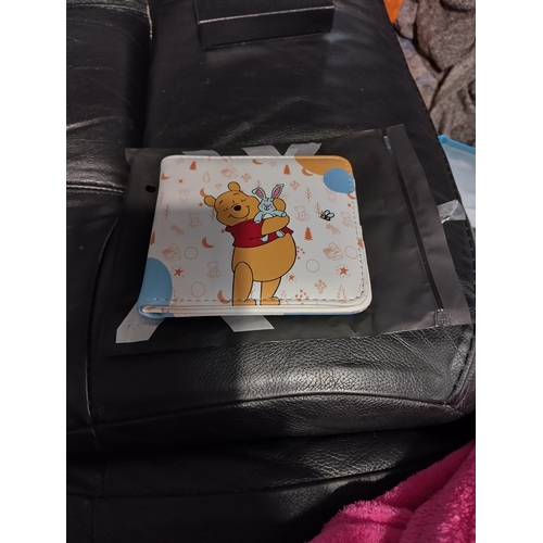 718 - NEW BAGGED WINNIE THE POOH WALLET