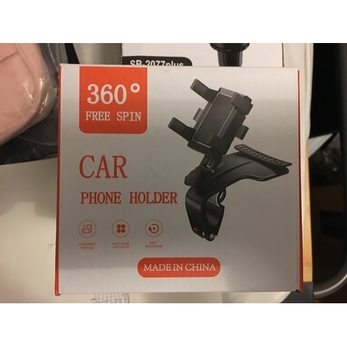 31 - NEW BOXED 360 SPIN CAR PHONE HOLDER