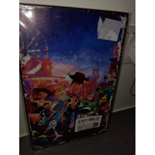 521 - New and sealed metal sign TOY STORY