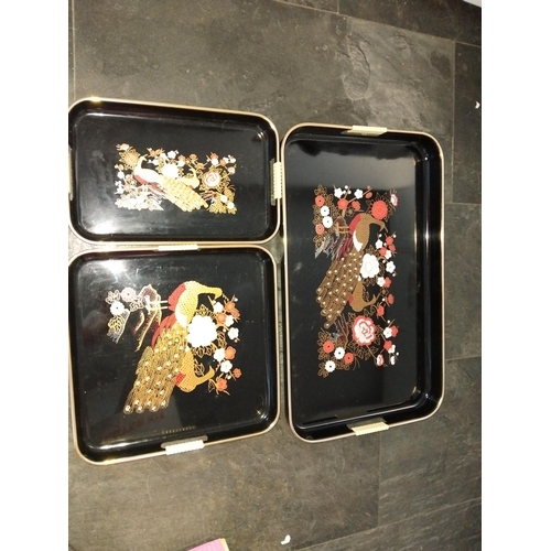 502 - THREE MATCHING ORIENTAL STYLE TRAYS