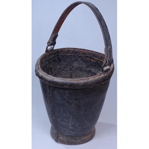 1 - A 19th century leather bucket with a leather swing handle, bucket height 11.5