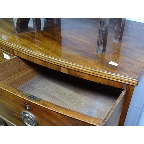 1117 - A 19th century mahogany bow-front 4-drawer chest, on bracket feet, W90cm