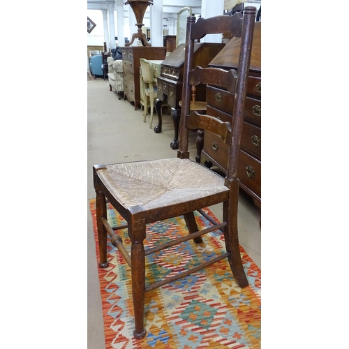 1123 - A 1920s rectangular oak draw leaf dining table, on spiral turned legs, length 136cm, together with a... 