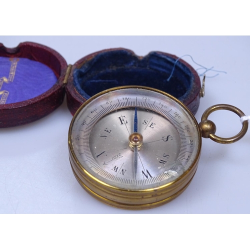 113 - A Stanley leather-cased pocket compass