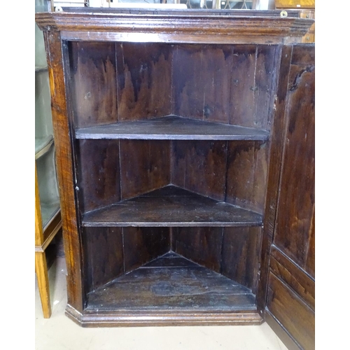 1160 - A Georgian oak hanging corner cupboard, with fielded panel cupboard door, W79cm, H100cm