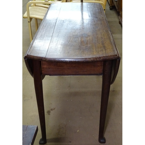 1176 - An 18th century mahogany drop leaf dining table on pad foot, W121cm