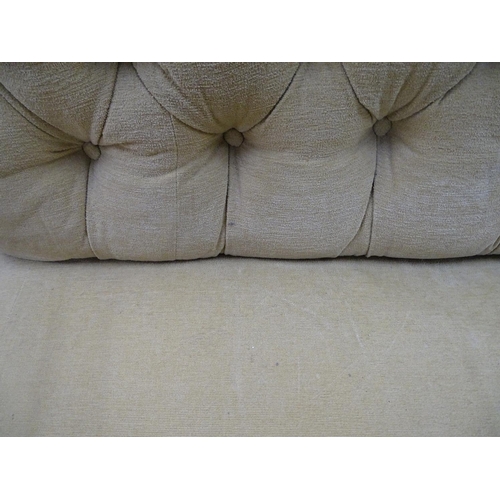 1177 - A Victorian button-back upholstered settee, raised on carved legs, L145cm