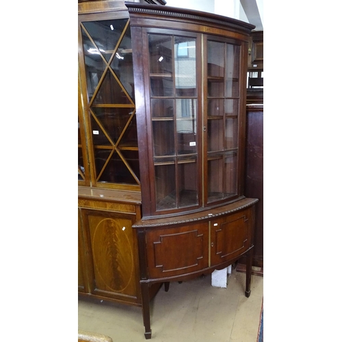 1189 - An Edwardian mahogany 2-section corner display cabinet, the top with lattice glazed doors, and cupbo... 