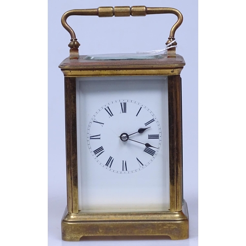 119 - A brass-cased carriage clock, height 5