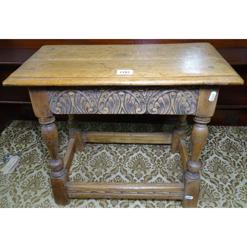 1191 - A carved oak joint stool, W56cm