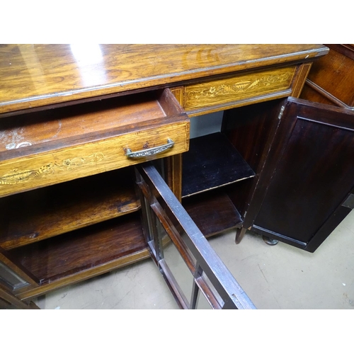 1195 - A Victorian rosewood sideboard, with a fitted drawer, beveled glazed cupboard door under flanked by ... 