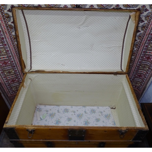 1222 - A 19th century dome-top and slatted travelling trunk, with steel banding, W83cm