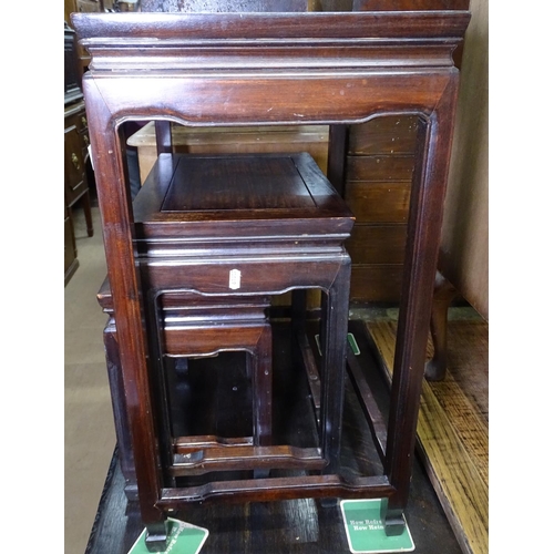 1247 - A set of 3 Oriental rosewood occasional tables, tallest 66cm