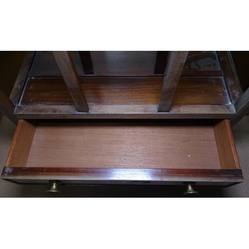 1258 - A 19th century mahogany Canterbury with drawer under, width 19