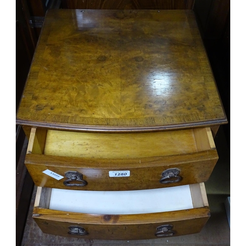 1280 - A 1930s walnut 3-drawer bedside chest, on cabriole legs, W42cm