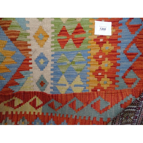 1300 - A large vegetable dyed wall Choli Kilim carpet, 306cm x 200cm