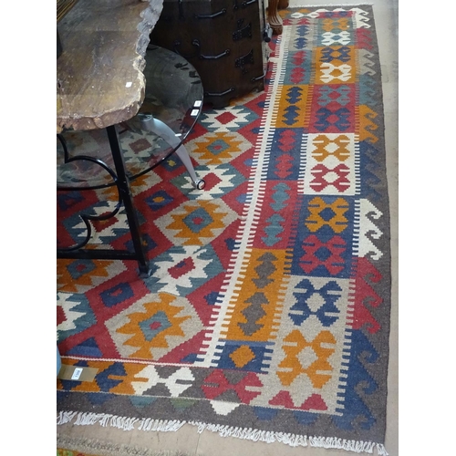 1308 - A multi-coloured Maimana Kilim carpet, 200cm x 280cm