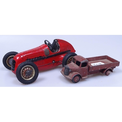 131 - A Dinky Toys Flat Back Austin Lorry, and an early clockwork racing car