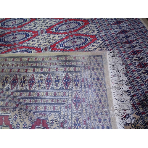 1315 - A beige ground Afghan design rug, 157cm x 124cm