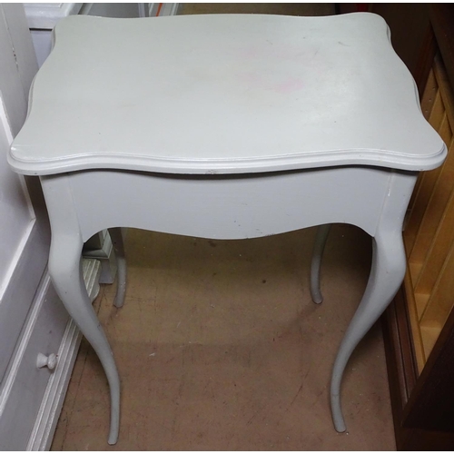 1323 - A grey and white painted cabinet, with panelled cupboards and drawer,W70cm, H173cm, and a painted si... 