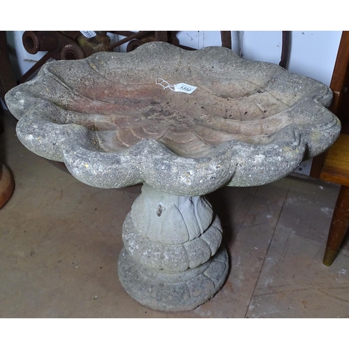 1332 - A weathered concrete shell design 2-section bird bath