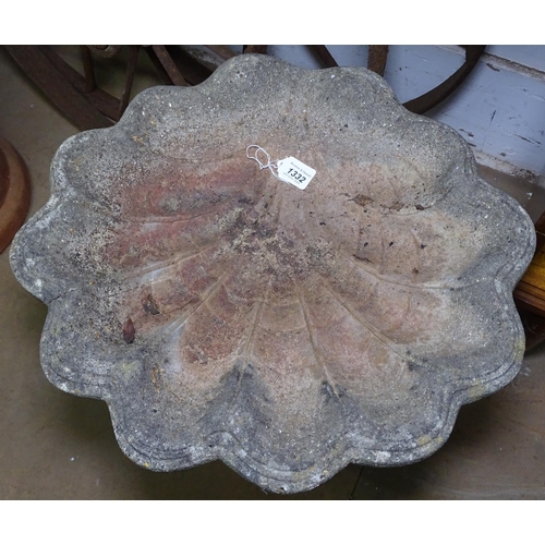 1332 - A weathered concrete shell design 2-section bird bath