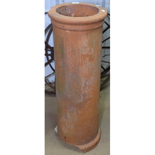 1334 - A terracotta chimney pot, H89cm