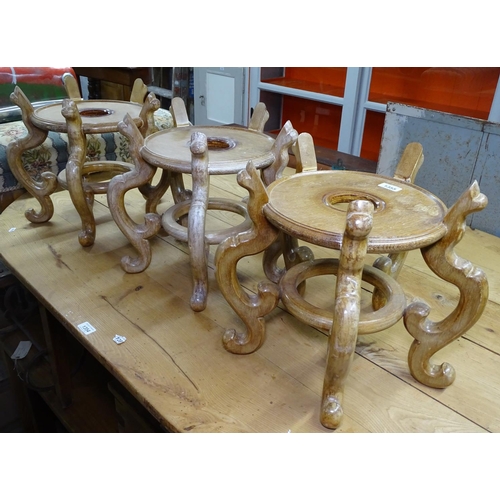 1355 - 3 Chinese hardwood stands, each having 5 scrolled legs, overall H36cm, overall W30cm, inner W26.5cm