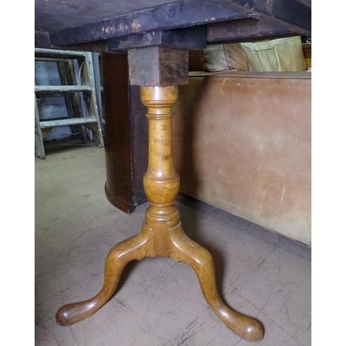 1364 - A Victorian circular oak tilt-top dining table, on a tripod base, W98cm, ex property of actor Trevor... 