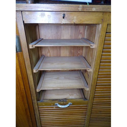 1389 - A 1920s oak double-tambour fronted filing cabinet, W84cm, H142cm