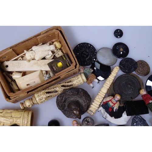 139 - Miniature bone items, a magnifier, miniature dolls etc