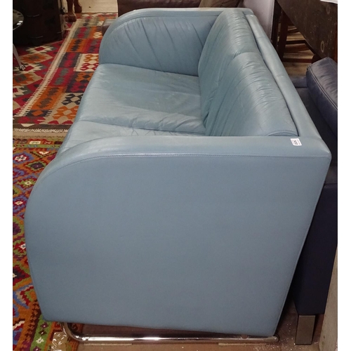 1410 - A modernist Art Deco design sofa in light blue leather, on tubular chrome sled base, L160cm