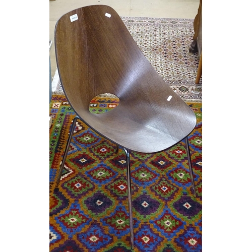 1414 - A shaped plywood chair in the manner of Vittorio Nobili, with chrome legs