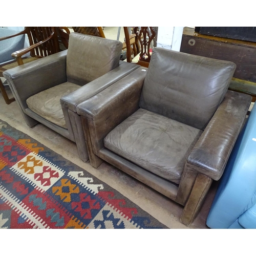 1418 - A pair of brown leather Danish design lounge club chairs