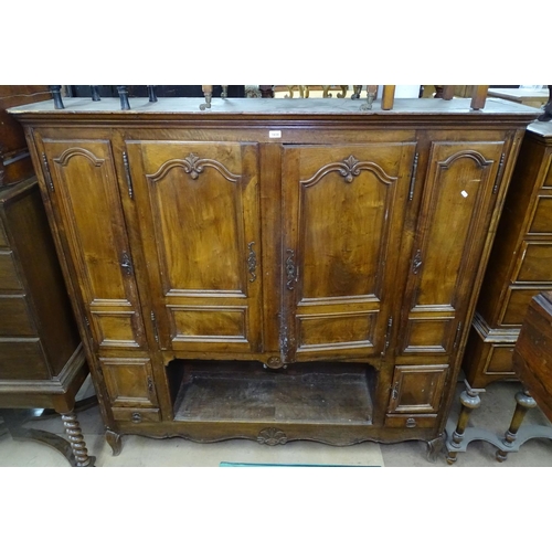 1439 - An Antique French walnut cabinet, with fitted panelled cupboard doors and scrolled cabriole feet, W1... 