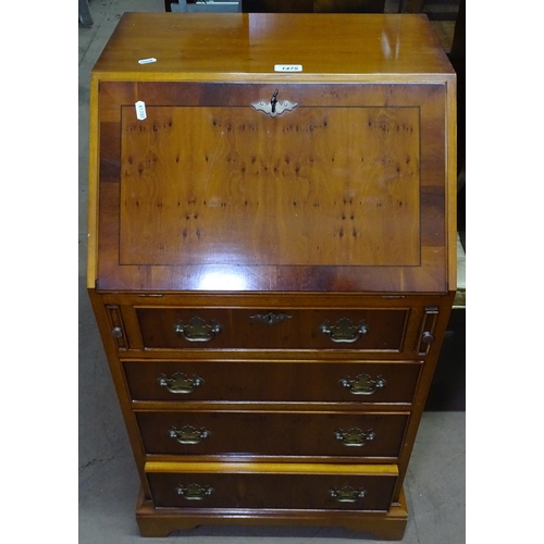 1475 - A reproduction cross-banded yew wood bureau, of narrow size, 4 graduated drawers, on bracket feet, W... 