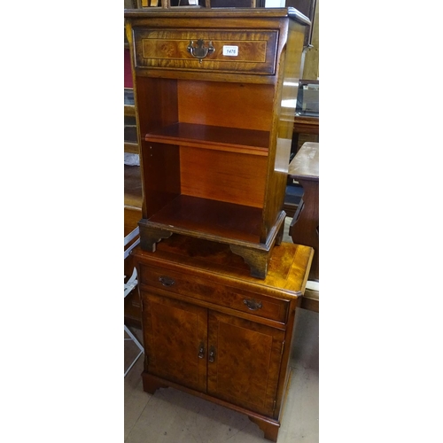 1476 - A reproduction cross-banded burr elm cabinet, with single drawer and cupboards under, on bracket fee... 