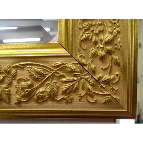 1480 - A modern rectangular gilt-framed beveled-edge wall mirror, L106cm, H75cm