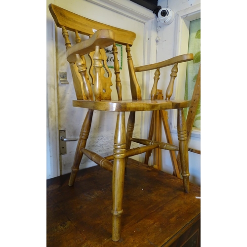 1502 - A pine and beech Windsor kitchen elbow chair