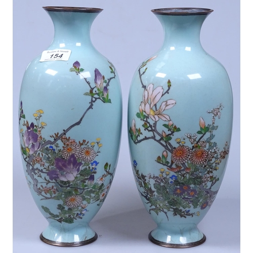 154 - A pair of cloisonne vases with floral decoration on duck egg blue ground, 12